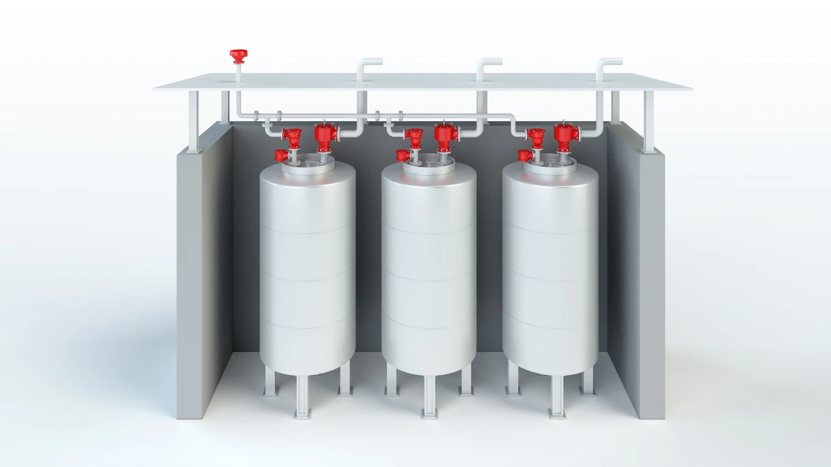 Roofed alcohol storage tanks fitted with PROTEGO® safety devices for industry compliance.